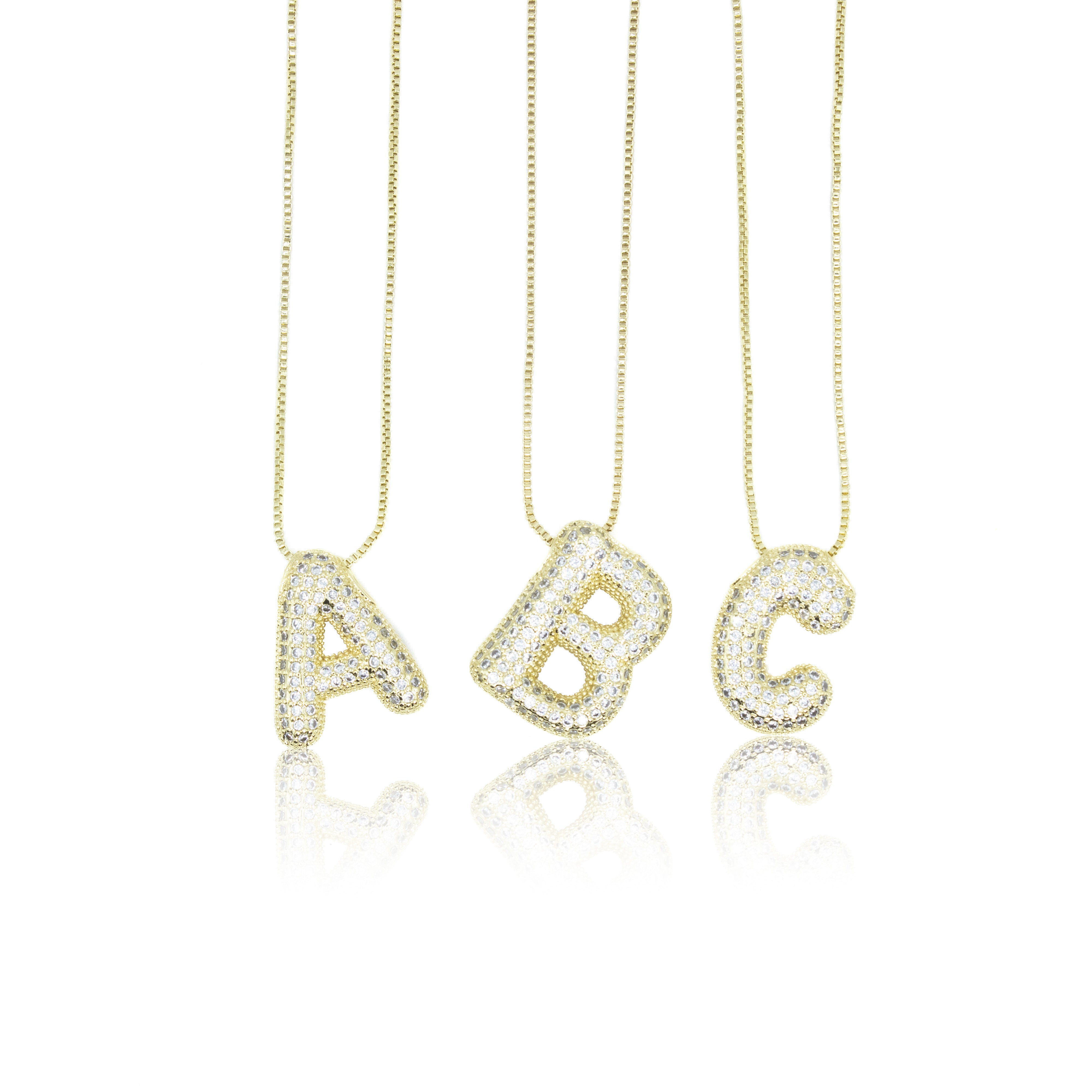 Collection of Inicial con Zirconia tipo globo y cadena con chapa de oro in a gallery layout
