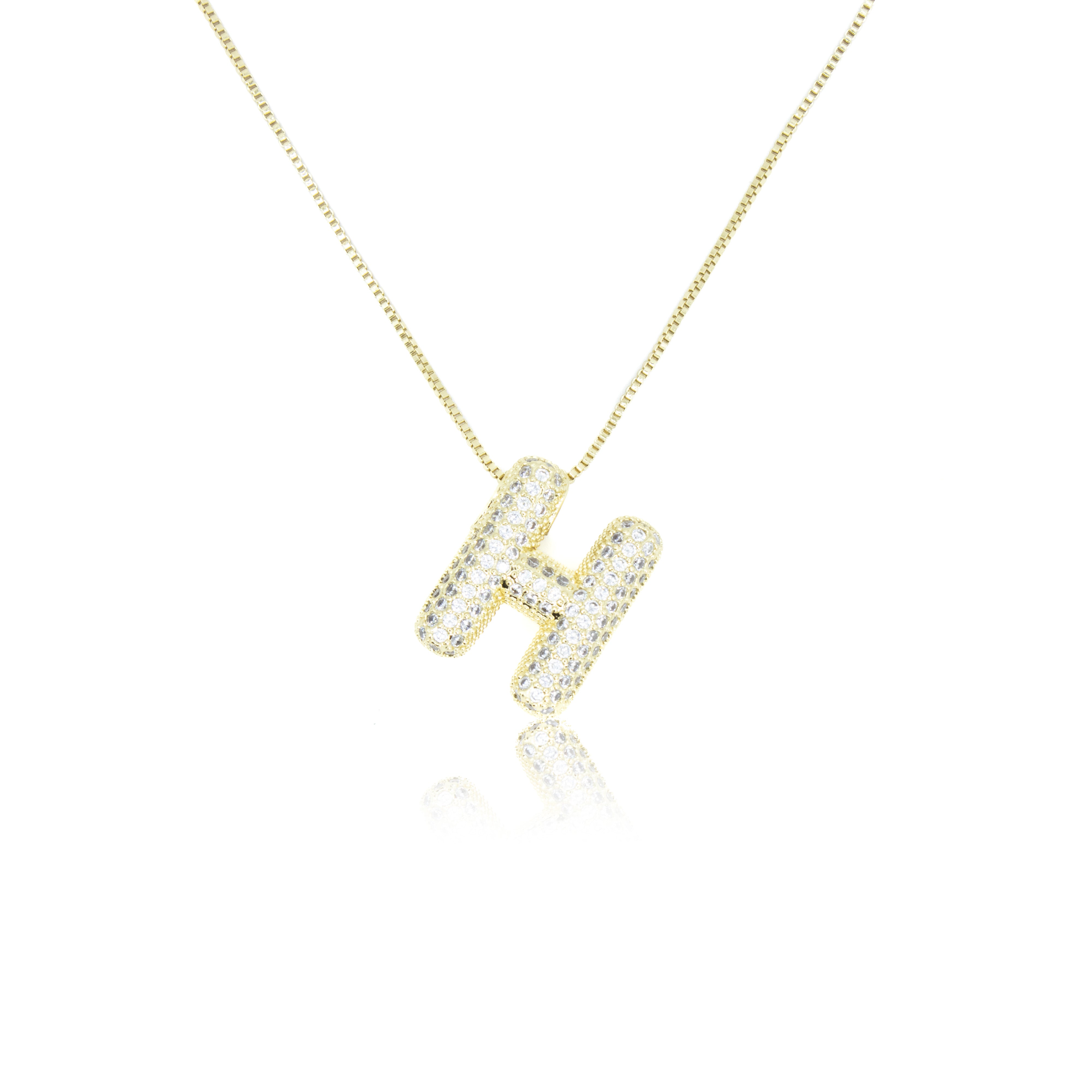 Collection of Inicial con Zirconia tipo globo y cadena con chapa de oro in a gallery layout