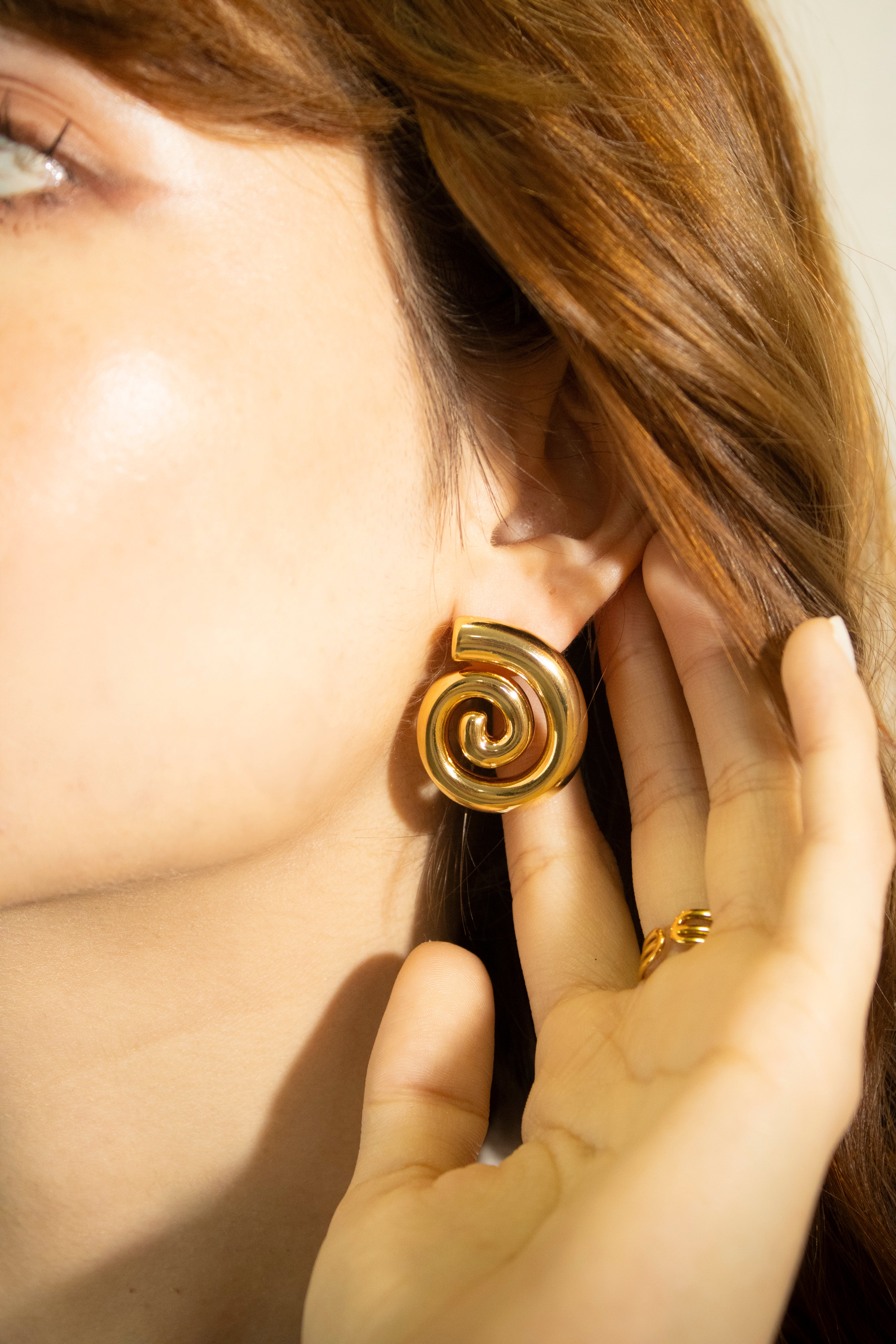 Collection of Arete espiral dorado in a gallery layout