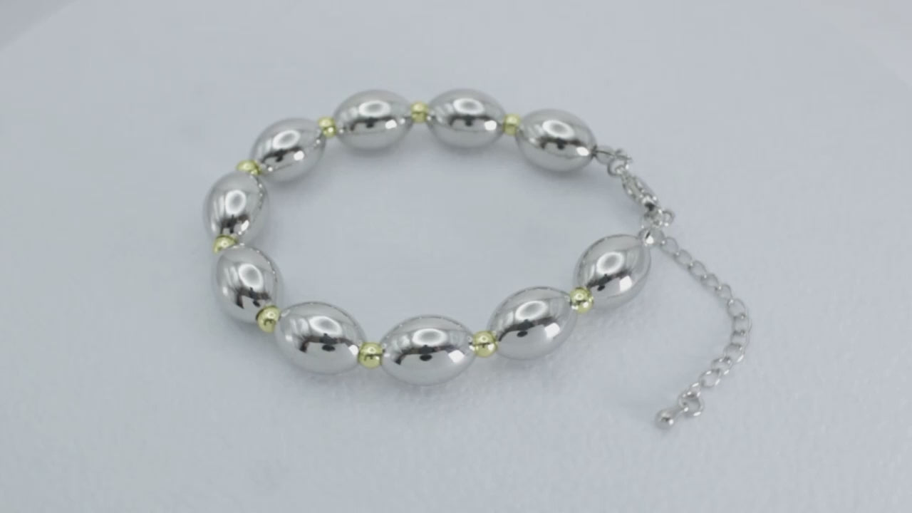 Collection of Pulsera Óvalo Plateado Bolitas Doradas in a gallery layout