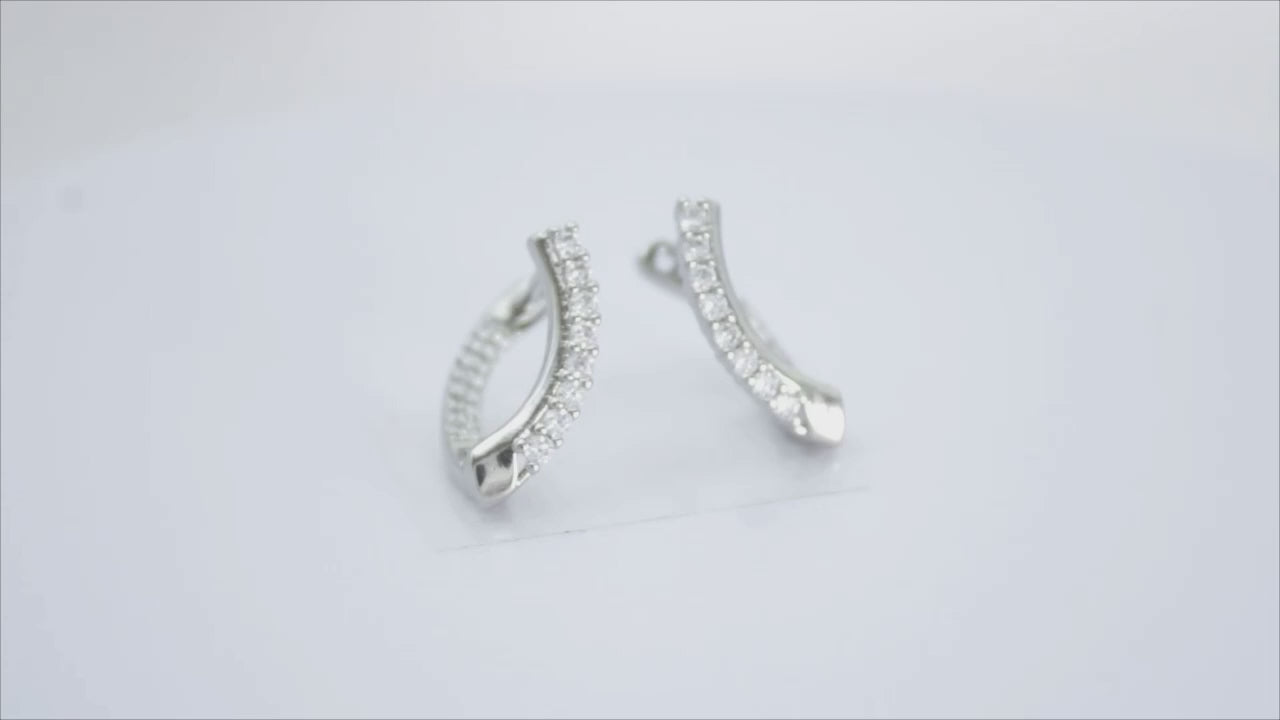 Collection of Aretes Con Zirconias Plateadas in a gallery layout