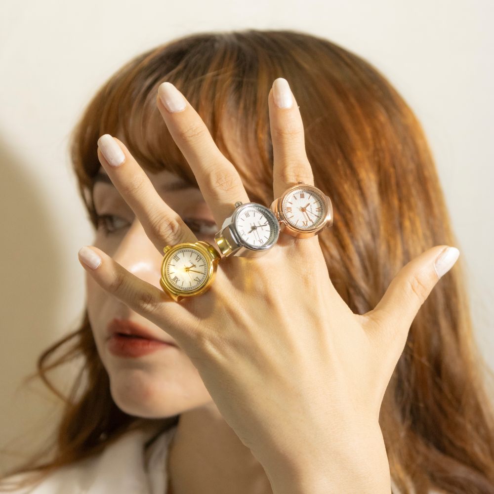 Collection of reloj anillo dorado in a gallery layout